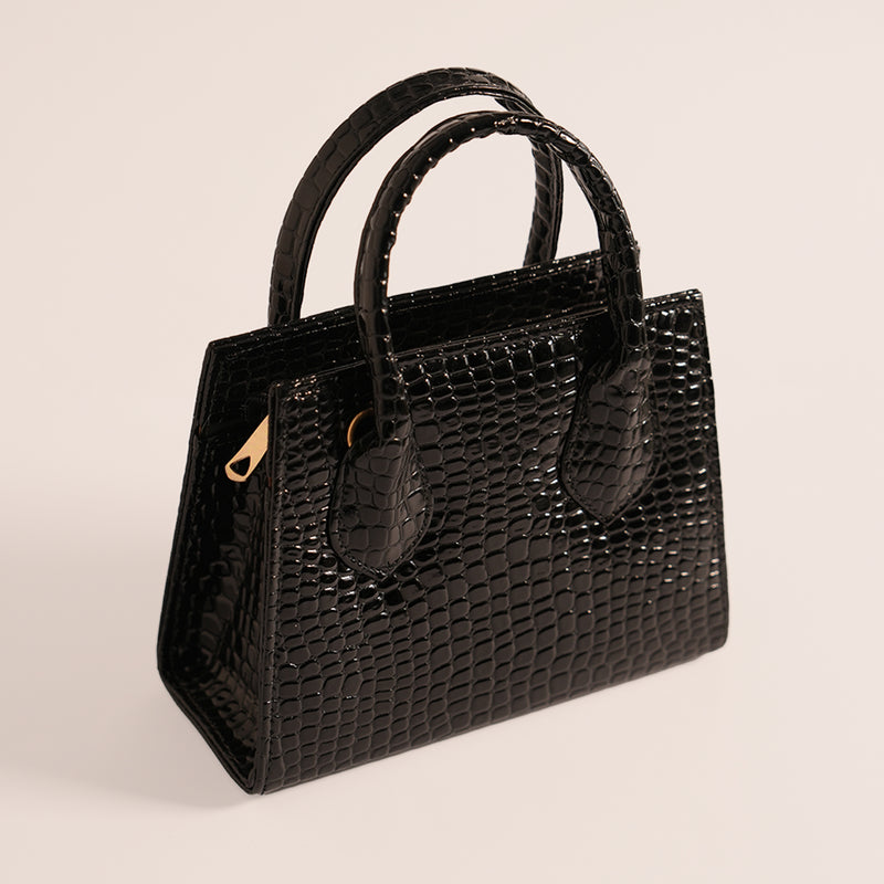 Side left view of Black Croc handbag